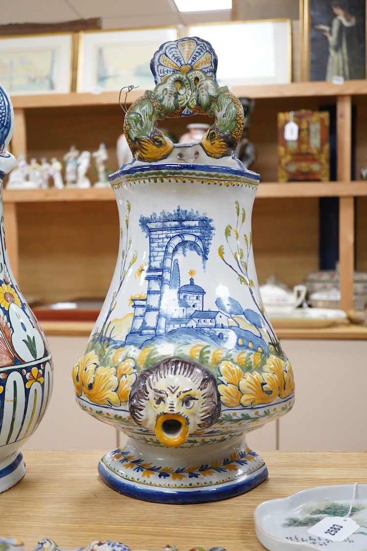Two French faience large water wall cisterns, a wall pocket and wall bracket, largest 58cm high